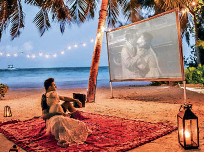 Romantic getaways beckon: Luxury resorts in Maldives offer a cosy outdoor movie experience.