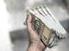 Rupee firms up 11 paise to 70.81