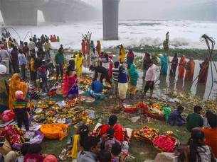 Delhi pollution: Devotees stand knee-deep in toxic foam in Yamuna for Chhath Puja