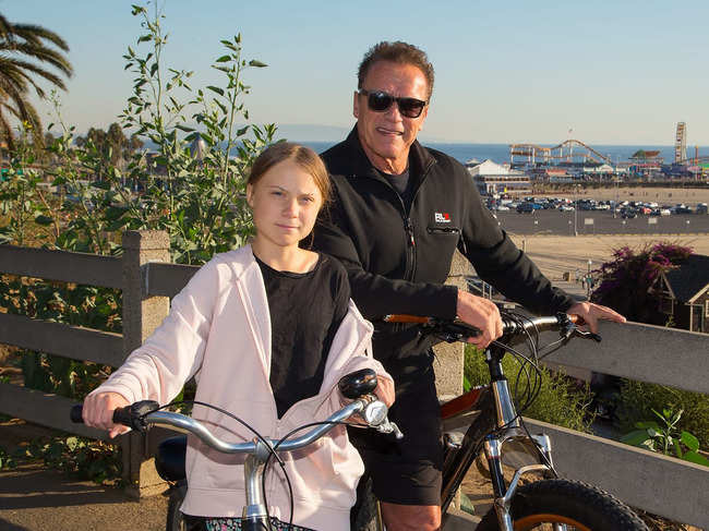 ​The Schwarzeneggers and Thunbergs rode their bicycles around Santa Monica, California. (In pic - Greta Thunberg & Arnold Schwarzenegger).