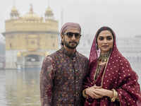 Ranveer Singh: Deepika, Ranveer are a royal dream in ivory and gold at  Mumbai reception - The Economic Times