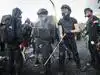 Campuses turn into armed camps