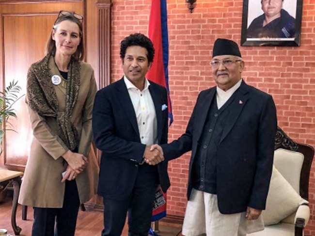 Sachin Tendulkar meets Nepal Prime Minister, KP Oli, during his visit, in Kathmandu.