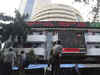 Sensex, Nifty flat; Voda Idea drops 8%