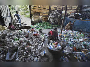 Kolkata: Workers segregate plastic waste for recycling purpose in Kolkata. Prime...