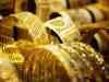 Gold, silver prices drop on low demand