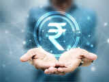 Rupee slips 12 paise to 71.74 against dollar