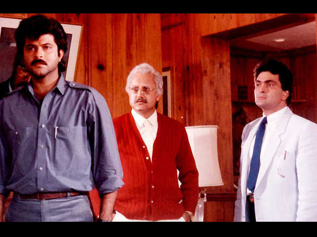 ​A still from Yash Chopra's 1988 film 'Vijay'​ featuring Anil Kapoor, Anupam Kher and Rishi Kapoor.