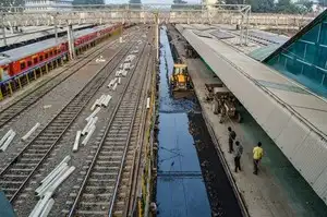 Workers clean railway tracks, in Jabalpur (PTI Photo)