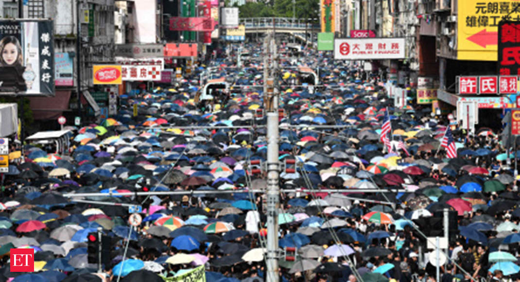 Hong Kong protesters mark half a year of protest with mammoth rally