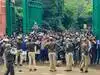 Police caning the protestors