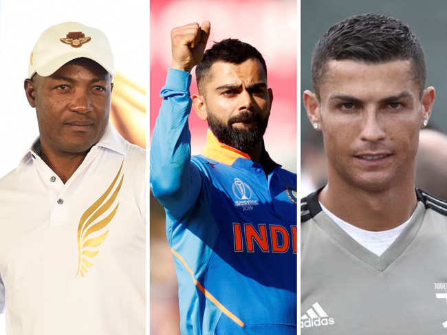 Brian Lara said that he is in awe of how Virat Kohli has honed his skills to take batting to an "unbelievable level". (In pic from left: Brian Lara, Virat Kohli, Cristiano Ronaldo)