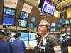 Wall Street ends lower on rising jobless claims