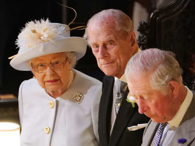 Queen Elizabeth II Prince Philip, Duke of Edinburgh and Prince Charles, Prince of Wales, attend the wedding of Princess Eugenie of York and Jack Brooksbank at St George's Chapel on October 12, 2018 in Windsor, England.