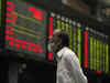Sensex drops 298 points, Nifty ends at 12,127; IOB soars 20%