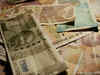 Rupee opens 20 paise up at 71.74 against dollar