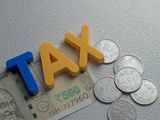 Announce convergence of all corporate tax rates to 15 pc in Budget: CII 1 80:Image