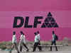 NCLAT asks DLF to register transfer of shares to investor's legal heirs, imposes cost of Rs 5 lakh