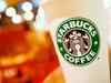 Starbucks brews up pact with Tata Coffee in India‎