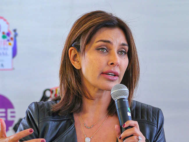 ​Talking about her book 'Close to the Bone', which chronicles her battle with cancer, Lisa Ray said she liked to describe it not as a memoir, but as a 'travelogue with a soul'. ​