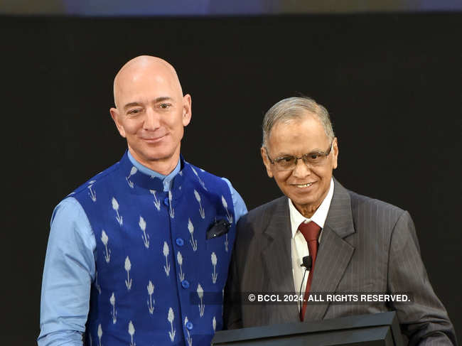 ​Amazon CEO ​Jeff Bezos (R) greeted Infosys Co-Founder​ ​Narayan Murthy during Amazon's annual event, Smbhav,​ in New Delhi​ on January 15, 2020.