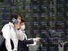 Tokyo stocks close lower on renewed virus jitters; Nissan dives