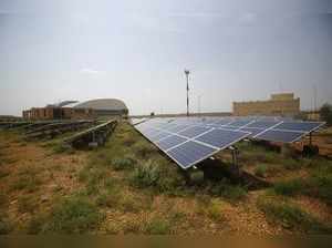 Solar panels are seen inside the premises of Jaisalmer Airport in the desert state of Rajasthan