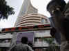 Sensex slips 100 points, Nifty below 12,100; Suzlon jumps 10%