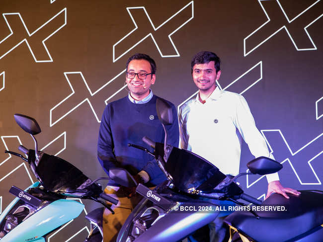 Tarun Mehta and Swapnil Jain, co founders of Ather Energy, with the new Ather 450X at the launch.
