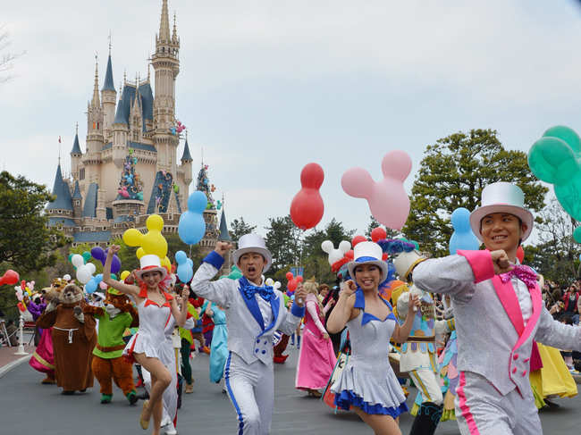 File photo of​ 2013: Disney characters and dancers parading as Tokyo Disneyland celebrates its 30th anniversary in Urayasu.