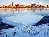 Chicago skyline reflects on thin ice layer