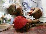 Workers stitches cricket balls in Meerut