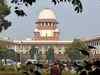 Land acquisition flawed without actual receipt of compensation: SC
