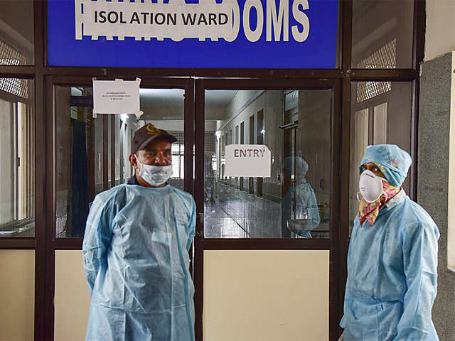 ​Medics outside an isolation ward