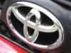 Toyota profits fall 39% on weak sales and strong yen