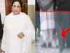 Security officer cleans Mayawati's shoes