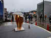 Thousands flock to see Olympic flame in Japan despite coronavirus fears