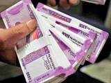 Rupee pares initial gains, settles 27 paise higher at 74.89 against US dollar