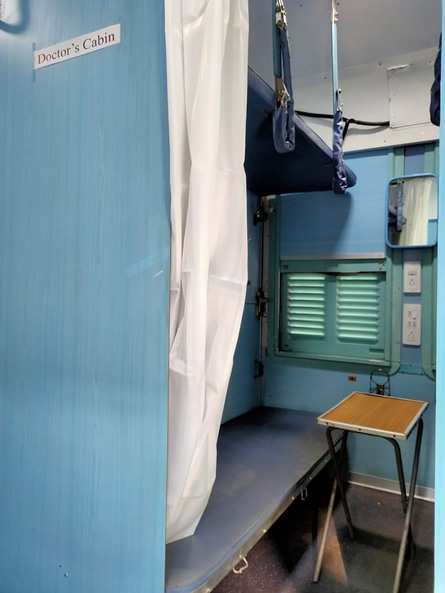 To make the isolation cabin, the middle berth has been removed from one side, while all the three berths have been removed in front of the patient berth