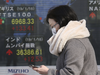 Japanese shares drop on fears of coronavirus forcing Tokyo into lockdown