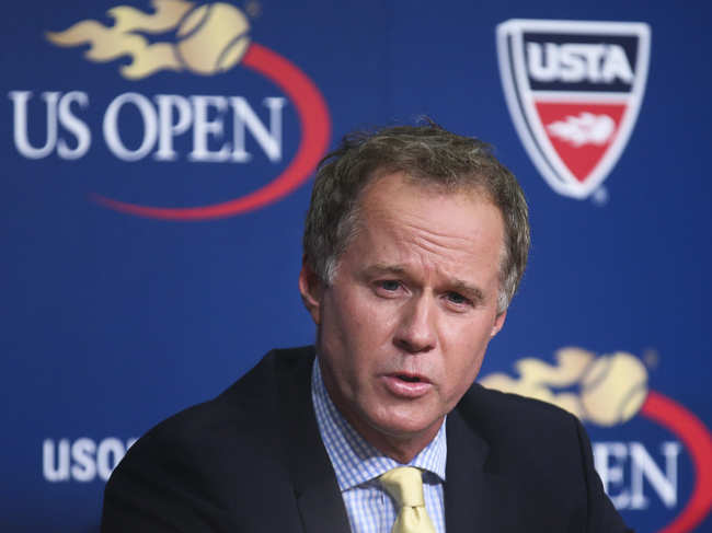 Patrick McEnroe? did a drive-through test in New York after developing "minor symptoms" about 10 days ago. ?