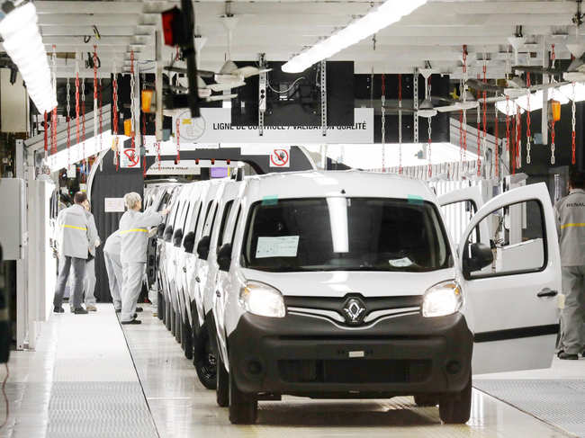 File Photo of 2018: Employees work on a vehicle assembly line at a Renault factory, in Maubeuge, northern France.