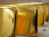 Gold prices dip as traders book profits