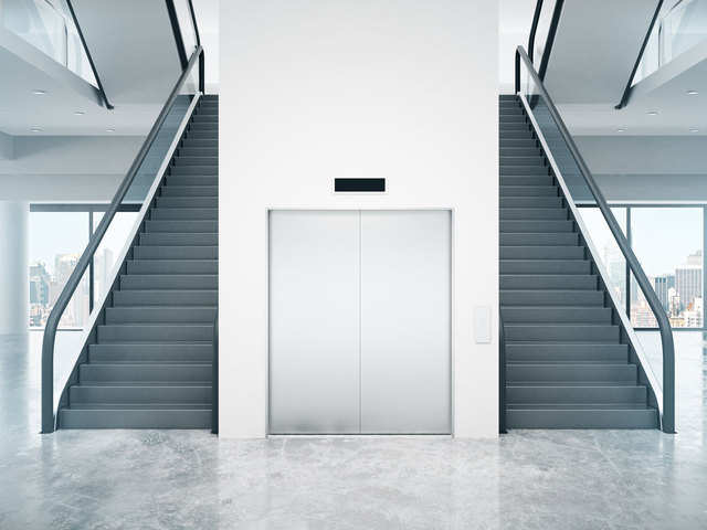 Encourage use of the staircase. In case of using lifts, adhere to the social distancing norms.