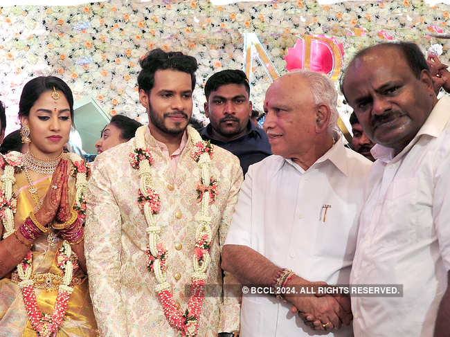 Karnataka CM BS Yeddyurappa (2nd right) blessed the newly-wed couple Nikhil Kumaraswamy (2nd left) and Revathi (left), and greeted former CM HD Kumaraswamy (right) in a private ceremony in Bengaluru.