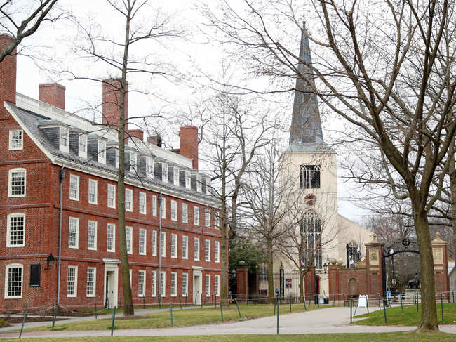 Wealthy colleges like Harvard are facing new pressure to reject the funding amid a similar outcry over major companies that received emergency aid meant for small businesses.