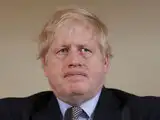Back at work, British PM Boris Johnson faces lockdown Catch-22