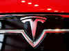 Stop, look, go: Tesla cars will now automatically detect traffic signals
