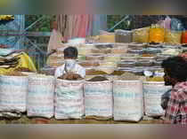 New Delhi: A vendor selling spices waits for customers during ongoing COVID-19 l...