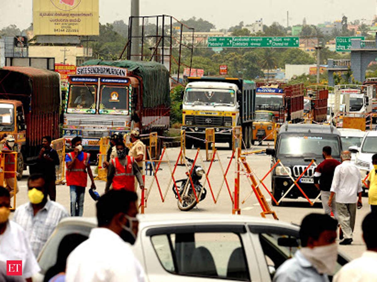 At Tamil Nadu Border Hundreds Of People Queue Up To Enter Karnataka The Economic Times